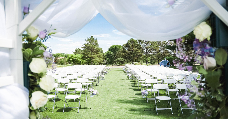 Exterior, chairs lined up for a Wedding ceremony