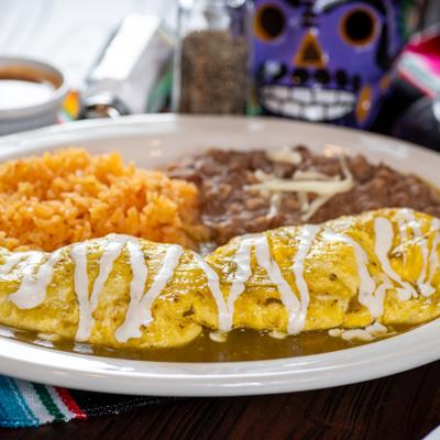 Enchilada omelet with rice and refired beans.