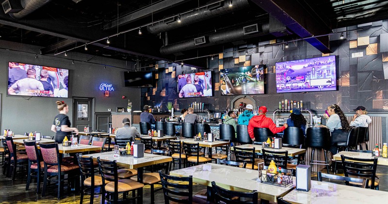 Interior, main dining area full of guests