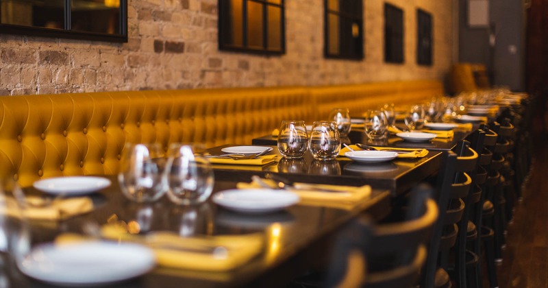 The dining tables are placed in a line