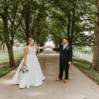 Wedding Couple standing in the driveway at Next Chapter Winery.