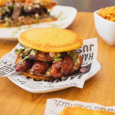 Grilled sausage sandwich.