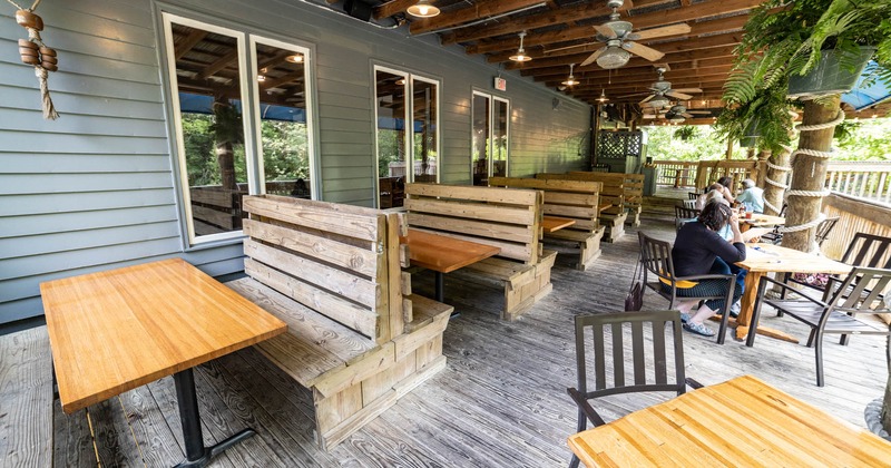 Exterior, covered booth seating area