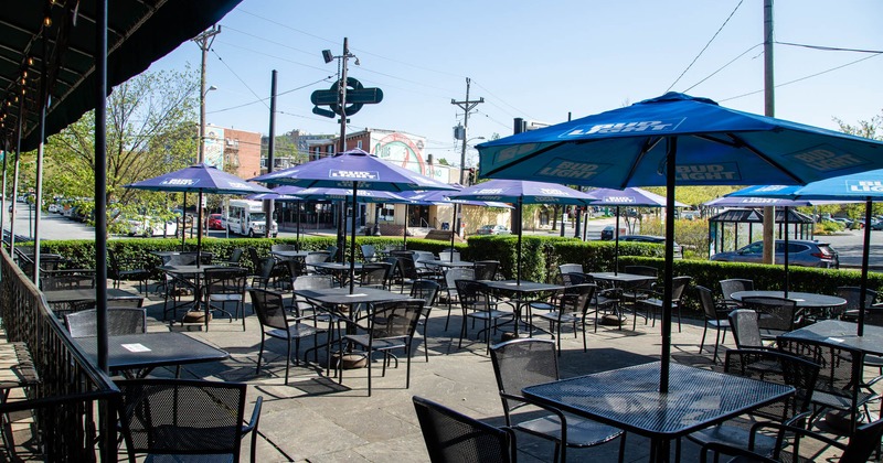 Exterior, patio tables and chairs with parasols