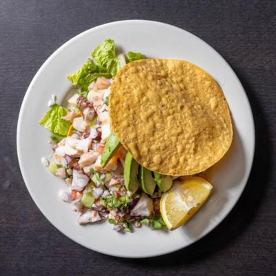 Shrimp ceviche with a crispy tortilla.