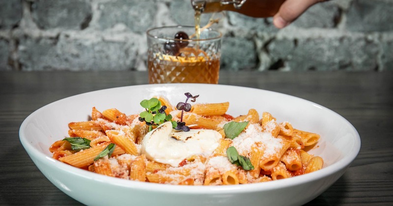 Creamy Tuscan Shrimp penne pasta and Old Fashioned cocktail