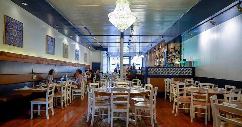 Spacious and cozy interior dining area with set tables