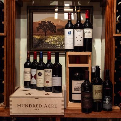 Assorted wine bottles.