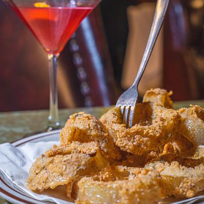 Hand-breaded onion rings