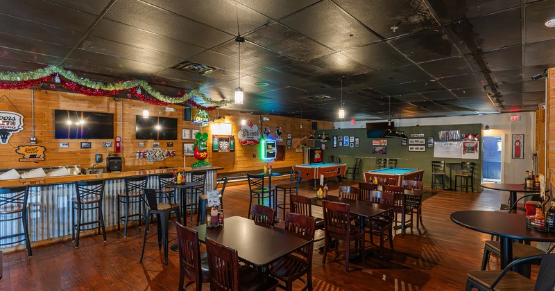 Interior, dining venue, tables, chairs, dining bar, pool tables behind