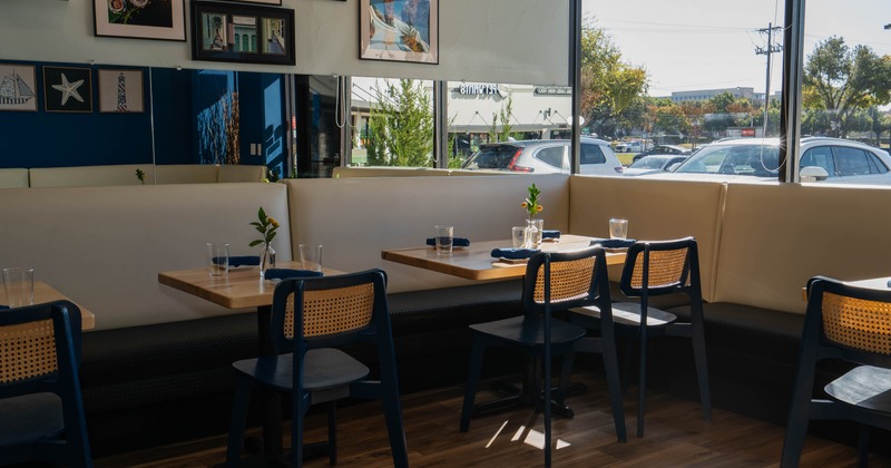 Interior, tables set in dining area