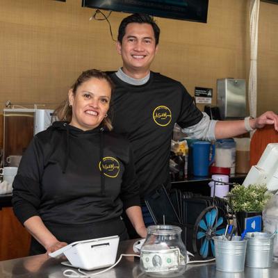 Staff members smiling for the camera