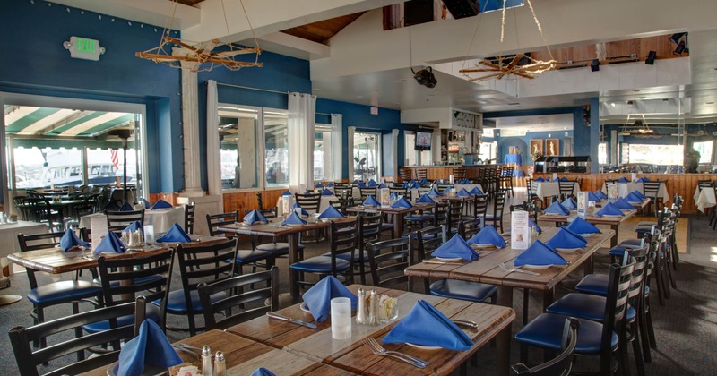Interior, dining area, wooden top tables with chairs, ready for guests