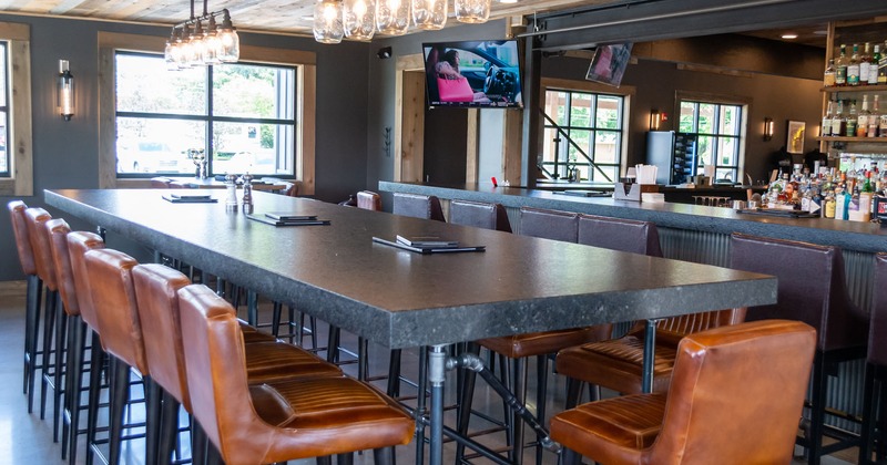 Interior, long table with tall chairs