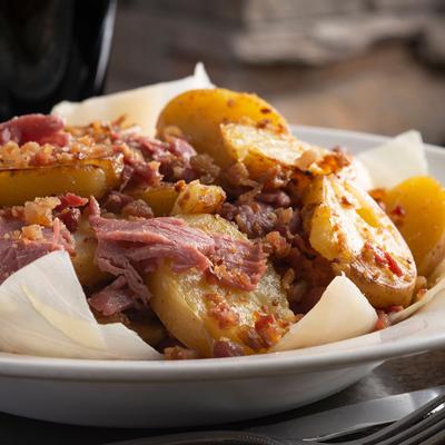 Baked potato, meat and spices