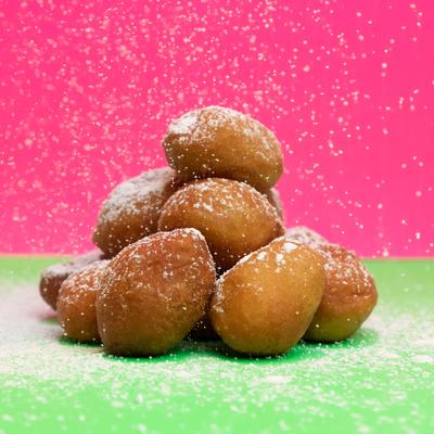 Doughnuts sprinkled with powdered sugar