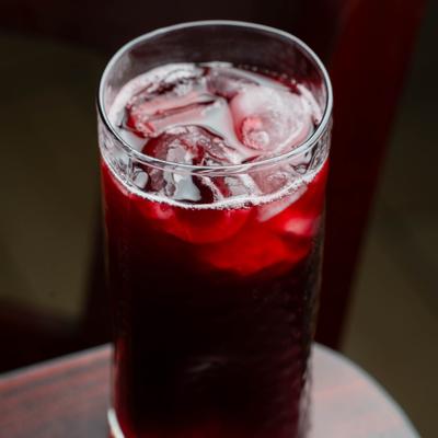 Glass of iced hibiscus tea.