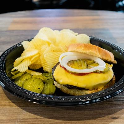 Burger with sides, served.