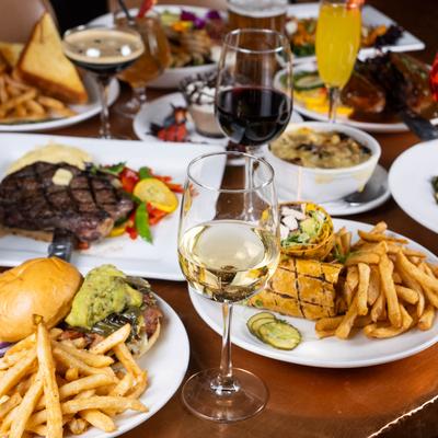 Assorted dishes and drinks on a table.