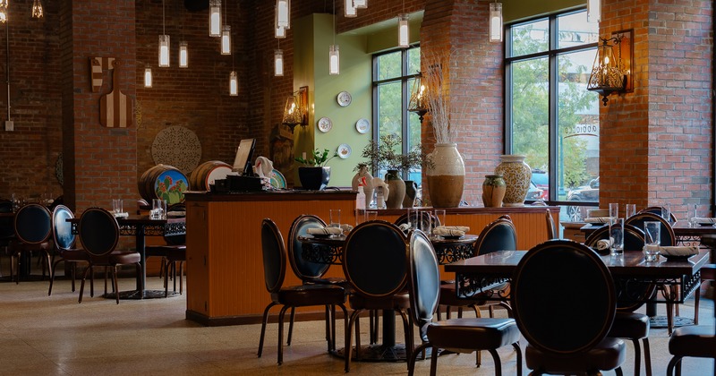 Cozy dining area with set tables ready for guests