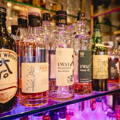 Various strong drinks in bottles.