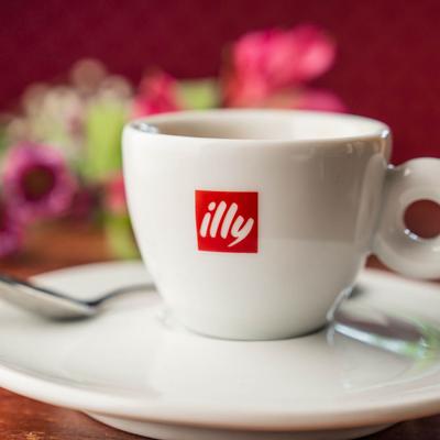 Espresso served in a white cup.