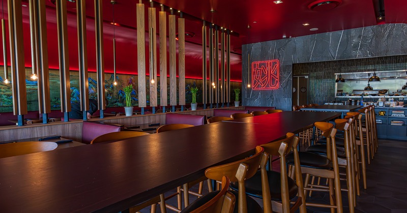 Restaurant interior, a long dining table close-up