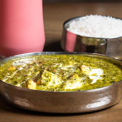 Saag Chicken, with baby spinach, and cream, served with rice.
