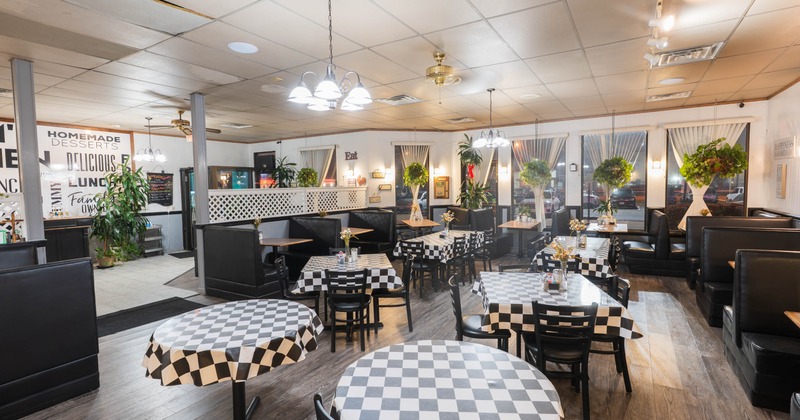 Interior, dining area, tables ready for guests