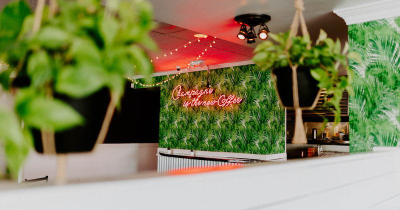 Interior, neon light message n the wall