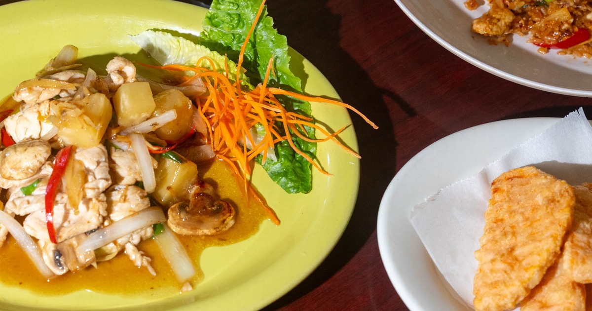 Pineapple and ginger stir-fry served alongside fried sweet potato