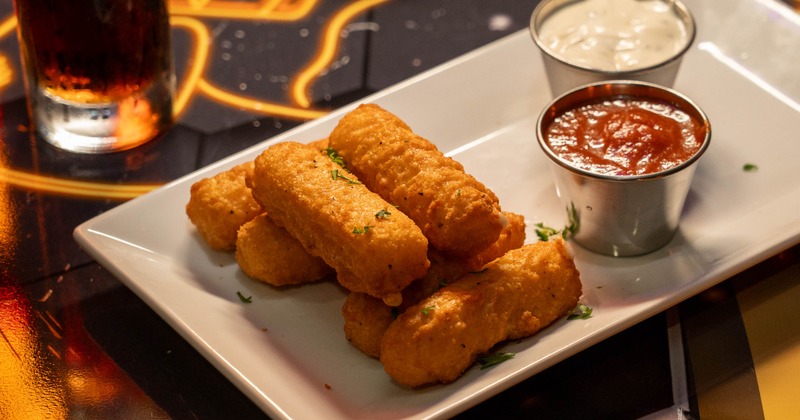 Mozzarella sticks with dipping sauces