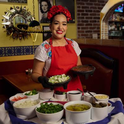 Person holding prepared food