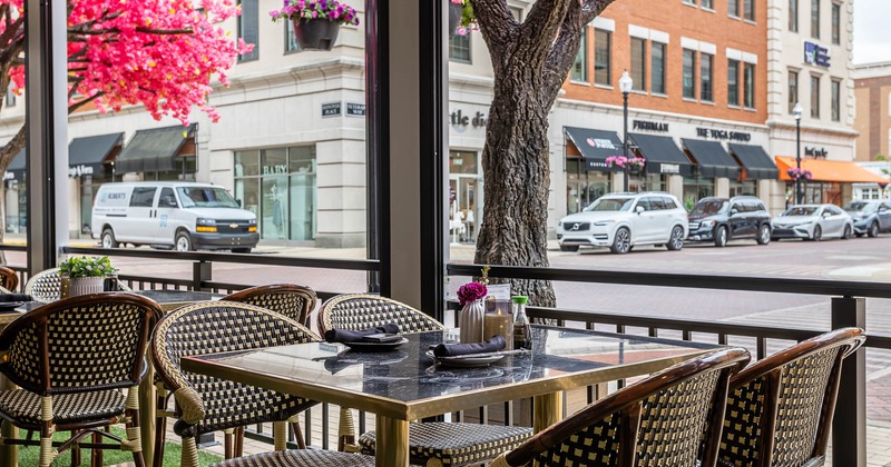 Exterior, patio, table for four with plates and tableware