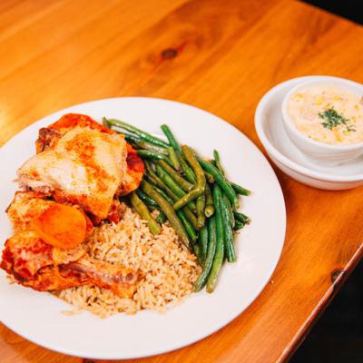 Roasted Chicken with rice and green beans, accompanied with Shrimp and Corn Chowder.