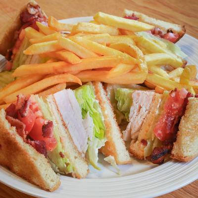 Club sandwich and fries