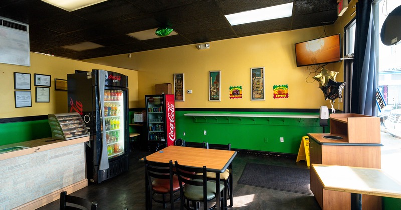 Interior, tables and chairs ready for guests