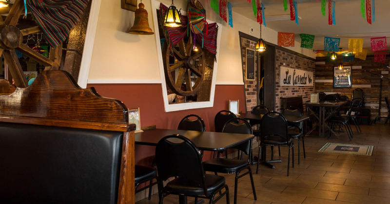 Interior, seating area with tables ready for guests