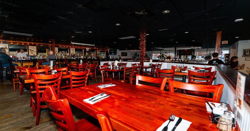 Interior, tables and chairs in dining area
