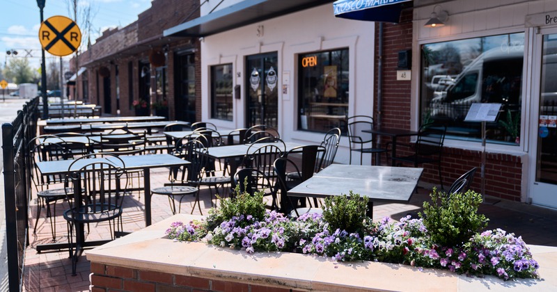 Exterior, side walk patio, tables, chairs