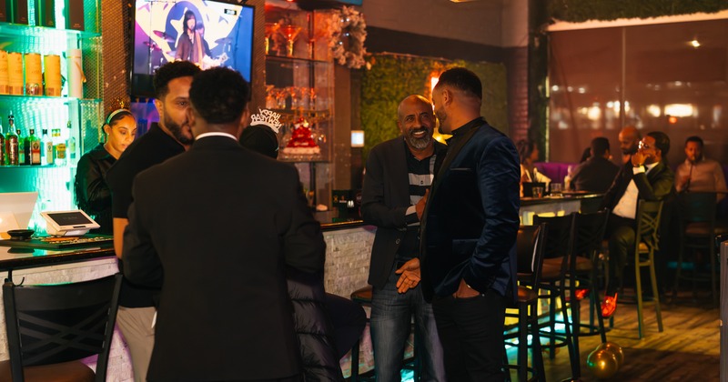 Interior, bar, bar stools, guests, owners, bartender, screen above