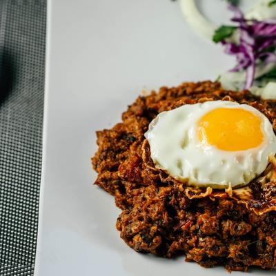 Fried egg with smoked eggplant spread.