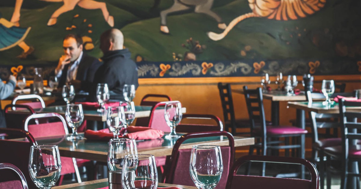 Interior, tables ready for guests
