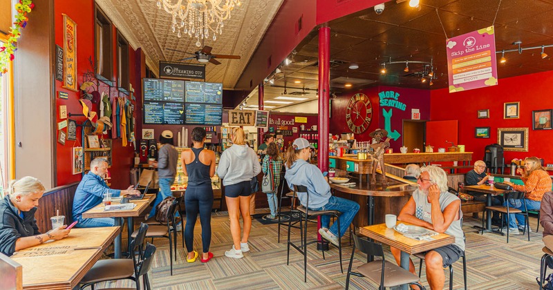 Customers dining and drinking