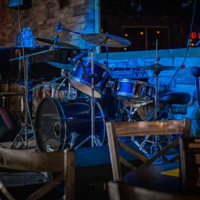 Interior, a stage with music gear on it.