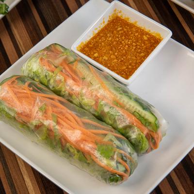 Fresh vegetable spring rolls with peanut sauce.
