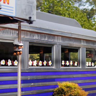 The restaurant's windows from the outside.