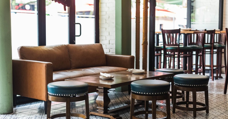 Interior, sofa and chairs around table