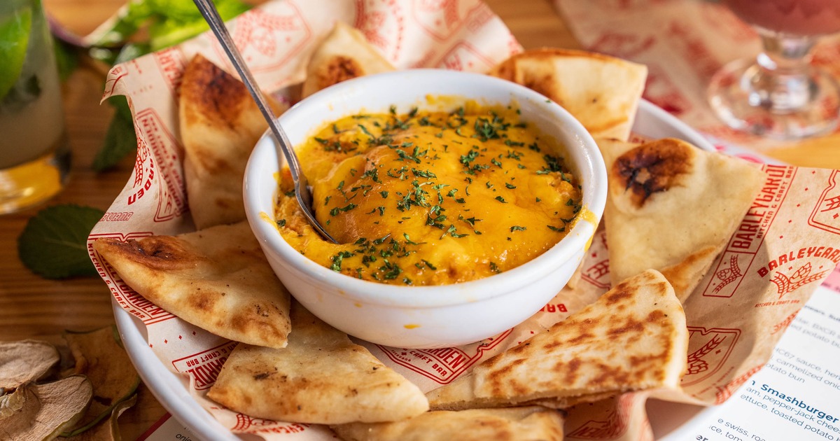 Buffalo Chicken Dip served with a toasted pita bread