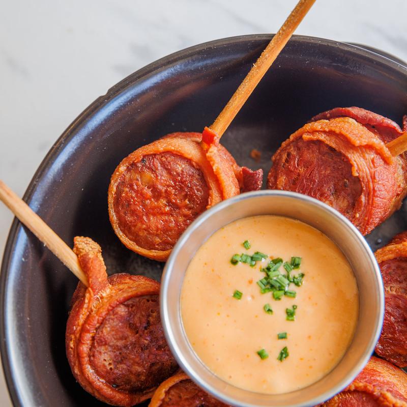 Bacon Wrapped Andouille Sausage Lollipops photo